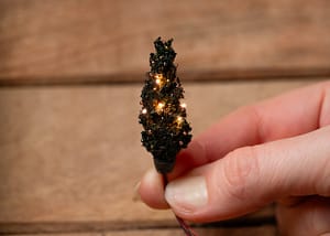miniature Christmas tree with micro led lights A miniature Christmas tree decorated with micro lights