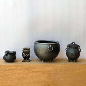 witch cauldrons A set of miniature cauldrons for a witch in a fairytale diorama