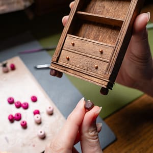 beads bookcase legs Wooden craft beads upcycled as legs for a miniature bookcase